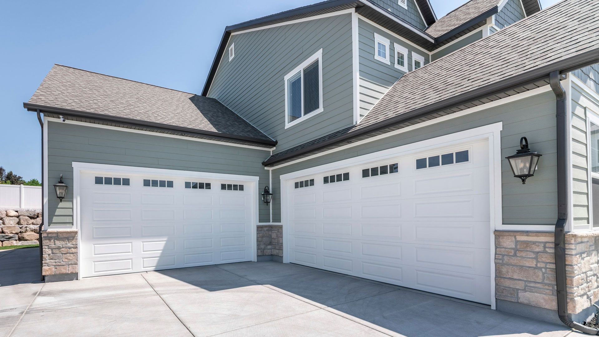 New garage doors on a new, modern house